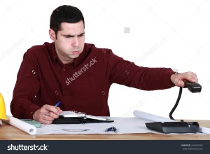 stock-photo-stressed-man-hanging-up-the-phone-244325683